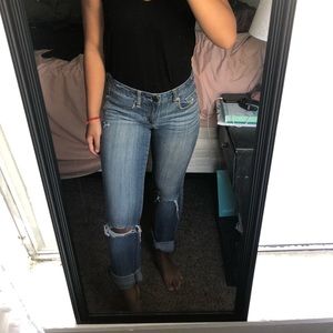 Distressed blue jeans